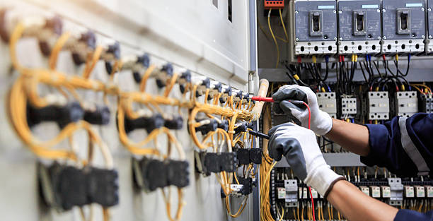 Professional Electrician technician working in Meadows Place, TX
